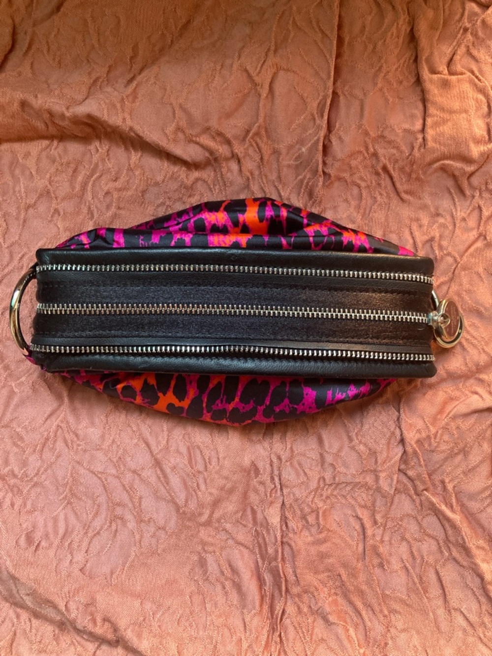 NWOT henri bendel Pink and Orange Leopard Print Cosmetic Case with Black Trim